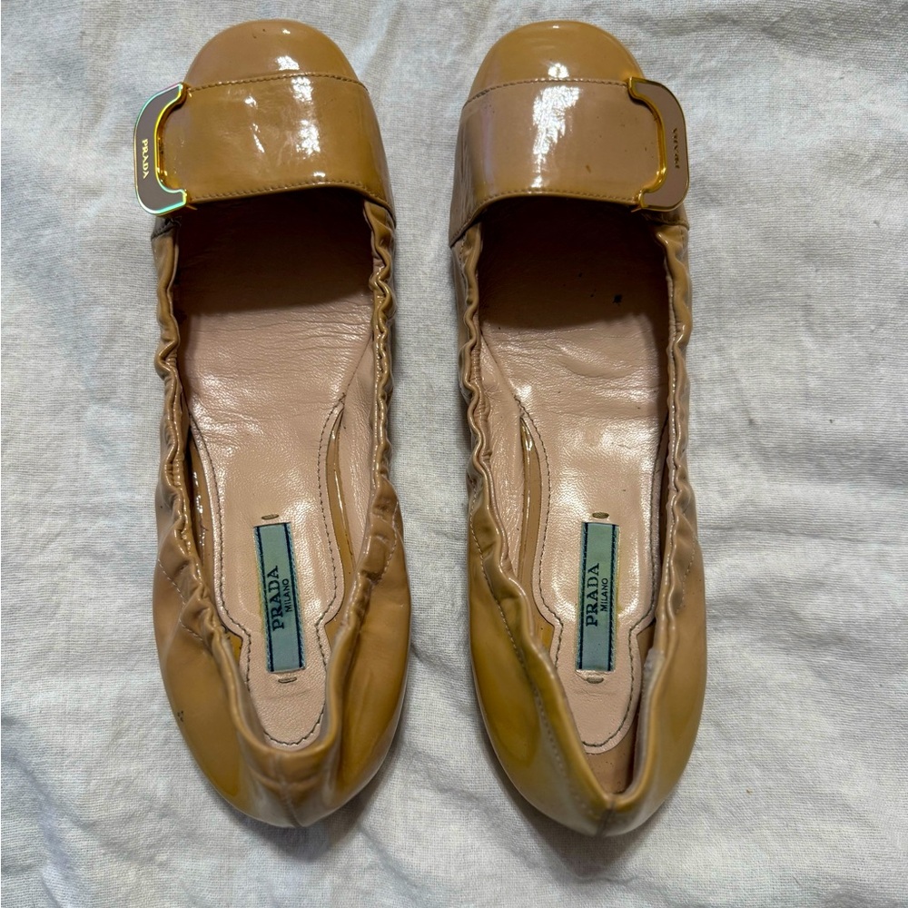 Ballerina flat shoes from Prada 
Size 36.5 
Slightly worn